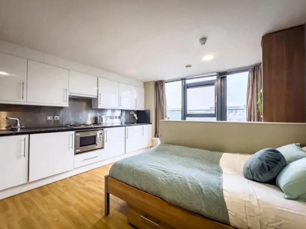 Bed kitchen counter and microwave studio apartment at Lady Nicolson Court in Edinburgh Student Accommodation
