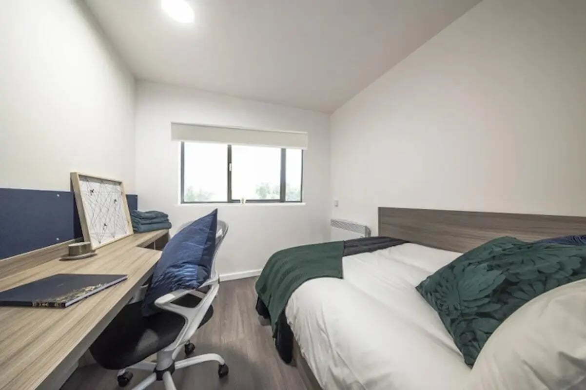 Desk bed and window student accommodation bedroom at Hollis Croft in Sheffield Student Accommodation