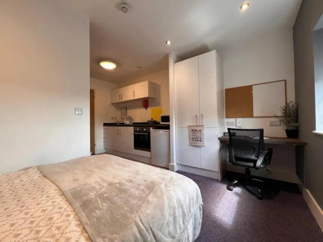 Bed kitchen study area and wardrobes studio at Hydrogen in Nottingham Student Accommodation