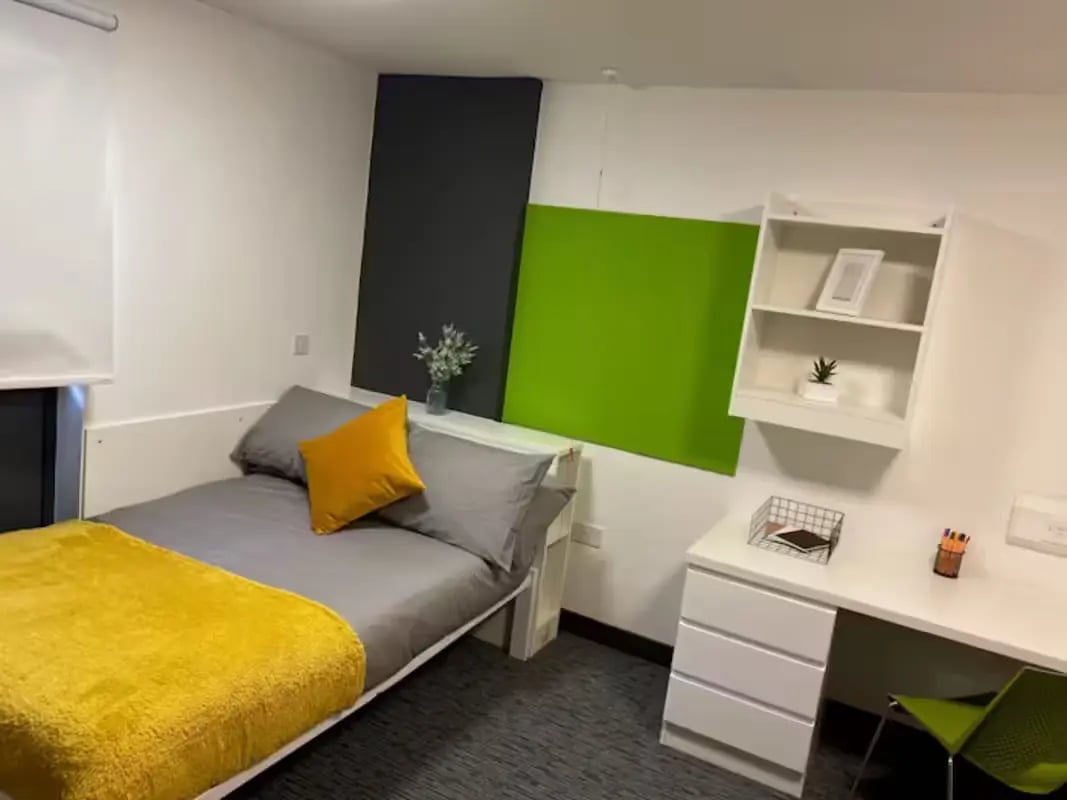 Bed desk and shelving unit bedroom at St James Point in Newcastle Upon Tyne Student Accommodation