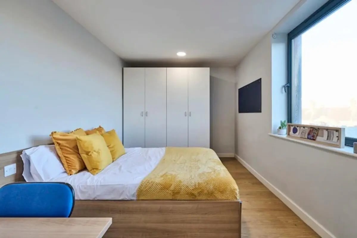 Bed wardrobe television window ledge bedroom at The Summit Leicester in Leicester Student Accommodation