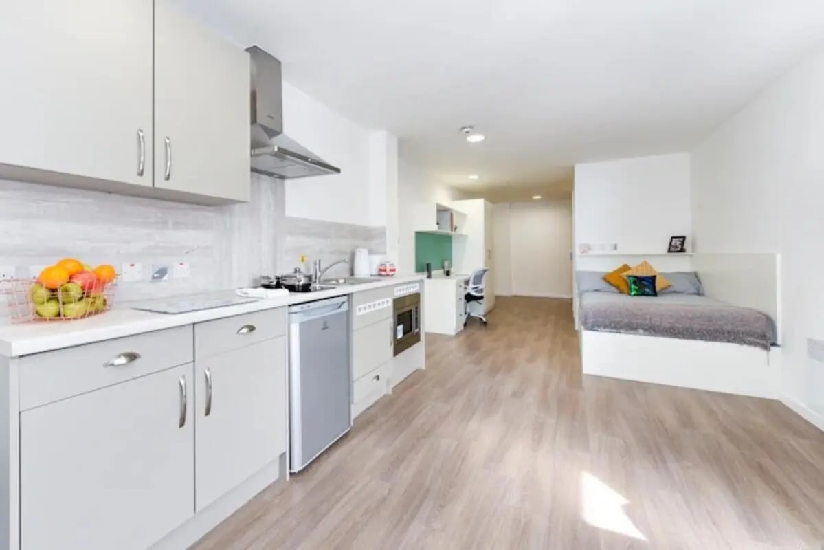 Bed kitchen desk and bed Studio apartment at Pittodrie Street in Aberdeen Student Accommodation