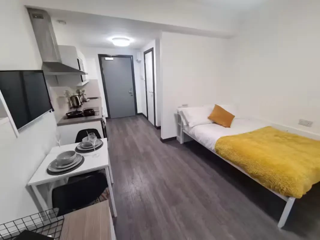 Bed kitchen and dining table studio apartment at St James House in Newcastle Upon Tyne Student Accommodation