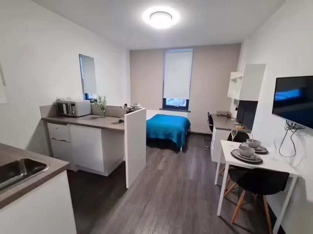 Bed microwave desk and kitchen studio apartment at St James House in Newcastle Upon Tyne Student Accommodation