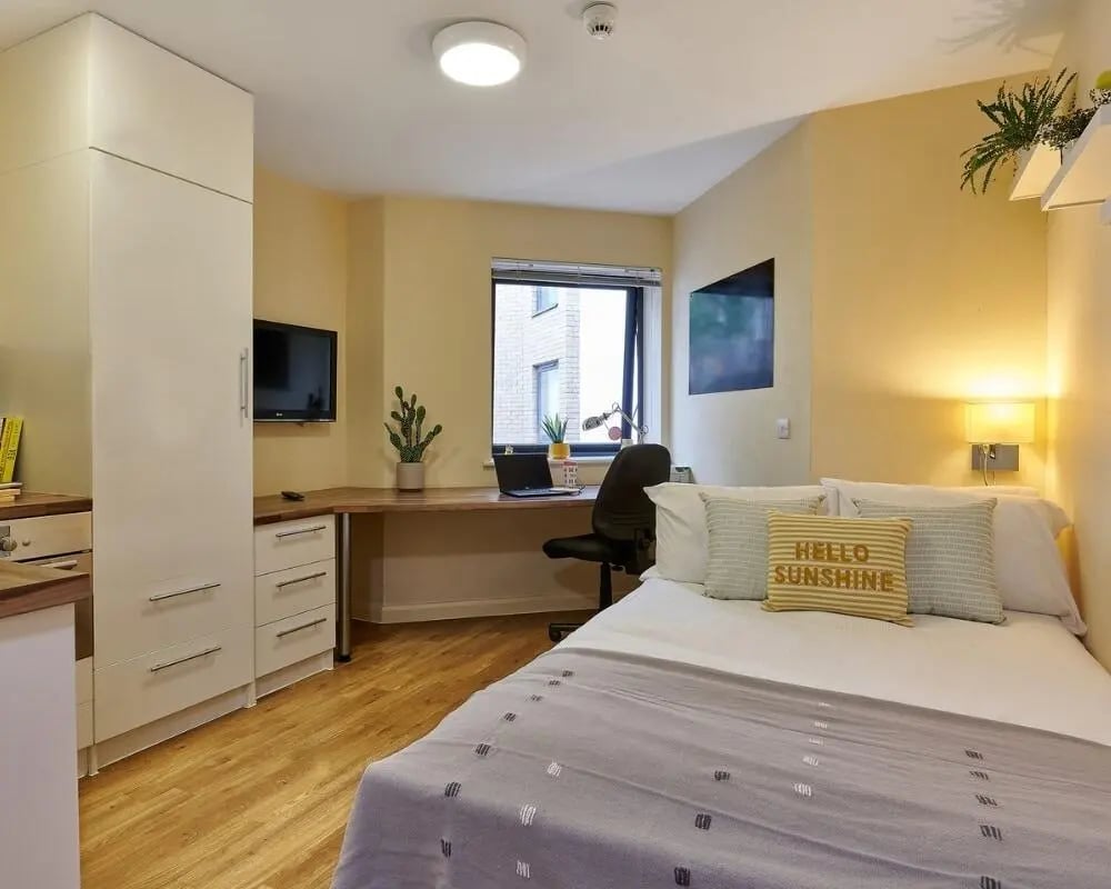 Bed desk wardrobe television student bedroom at The Hub in London Student Accommodation