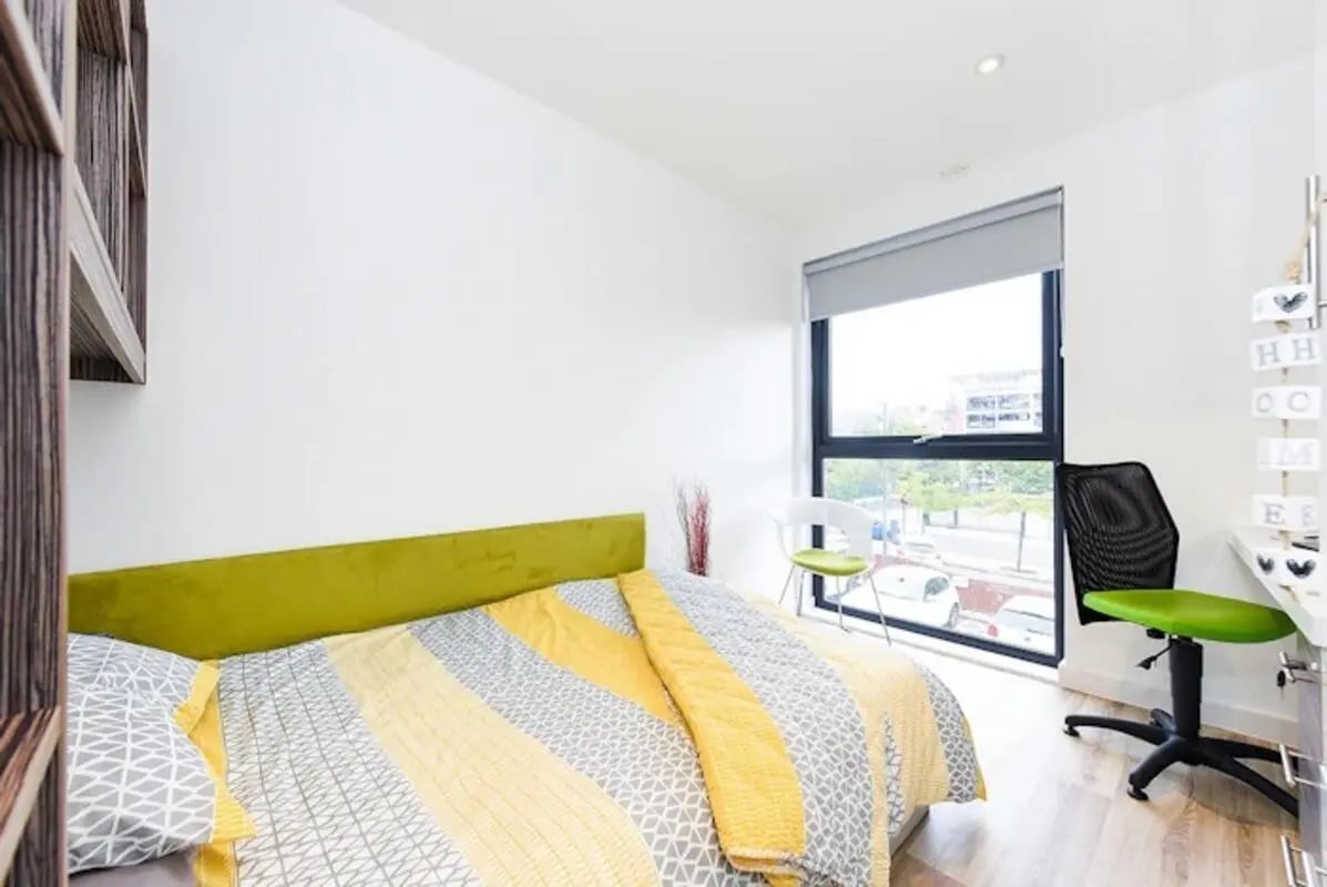 Bed desk chair and window bedroom at Newcastle 1 in Newcastle Upon Tyne Student Accommodation