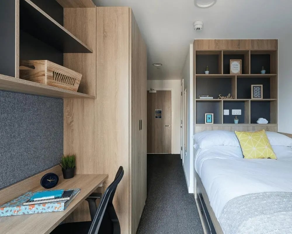 Desk bed wardrobe shelving student bedroom at Southampton Crossings in Southampton Student Accommodation