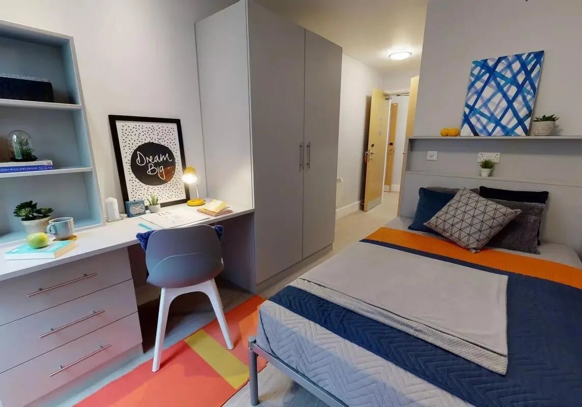 Desk bed wardrobe study area bedroom at iQ Magenta House in London Student Accommodation