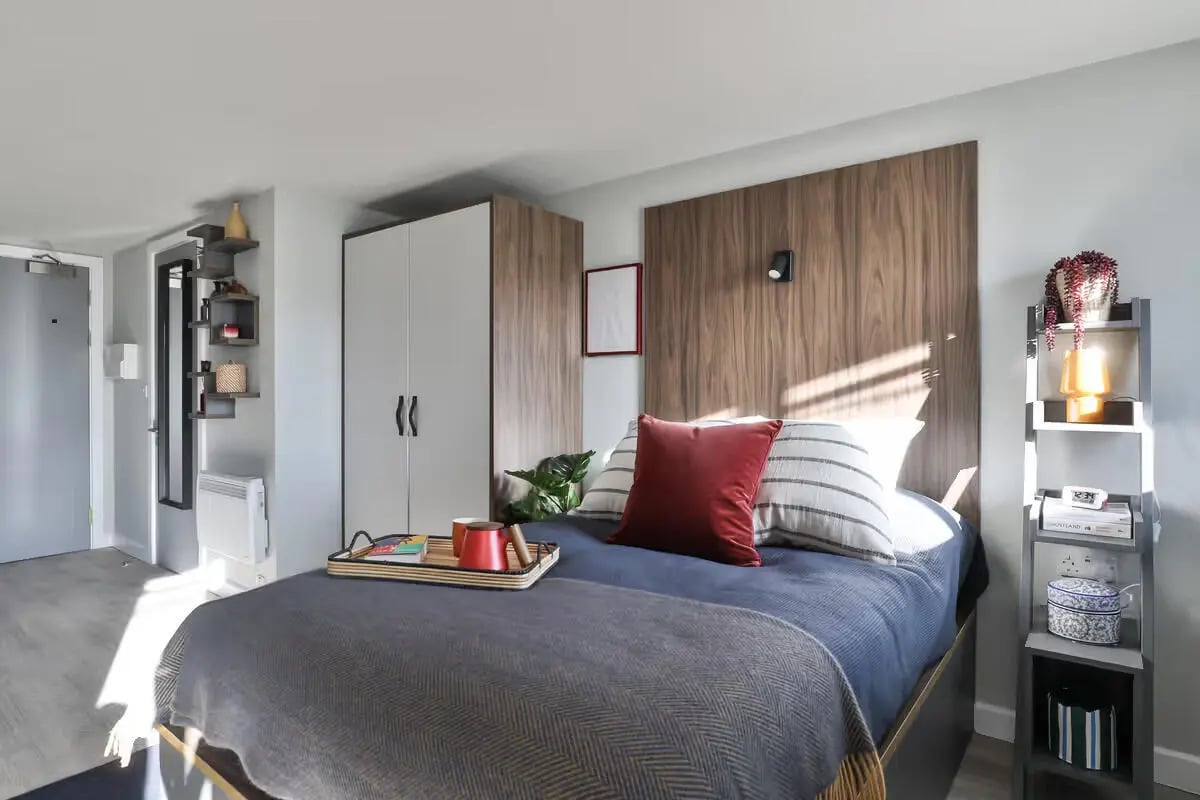 Bed wardrobe shelf and tray bedroom at St Mark's Court in Leeds Student Accommodation