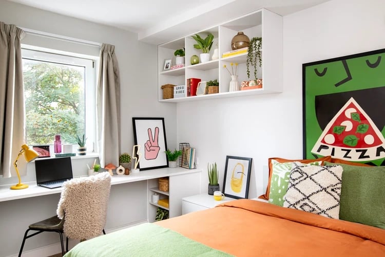 Desk laptop fluffy chair pizza poster bedroom at Cedar House in Liverpool Student Accommodation