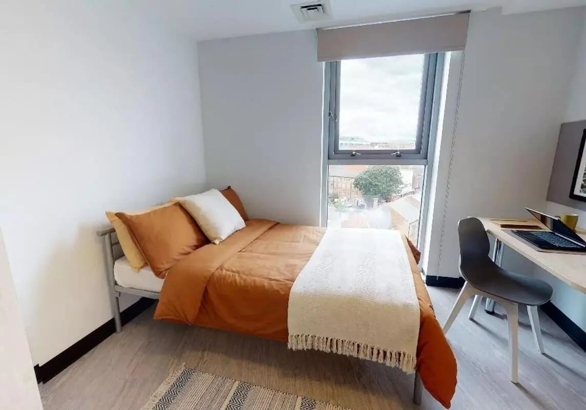 Bed desk and window bedroom at iQ Exchange in Nottingham Student Accommodation