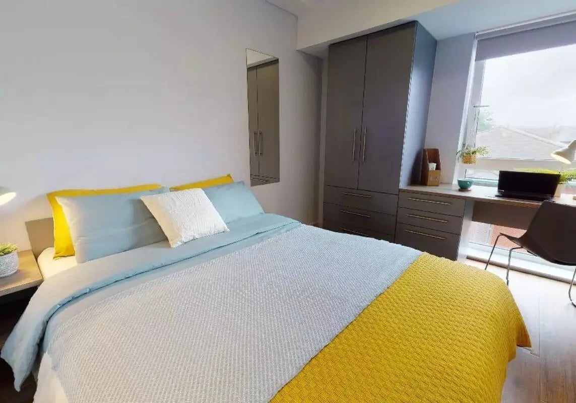 Bed desk wardrobe and window bedroom at iQ Collingwood in Newcastle Upon Tyne Student Accommodation
