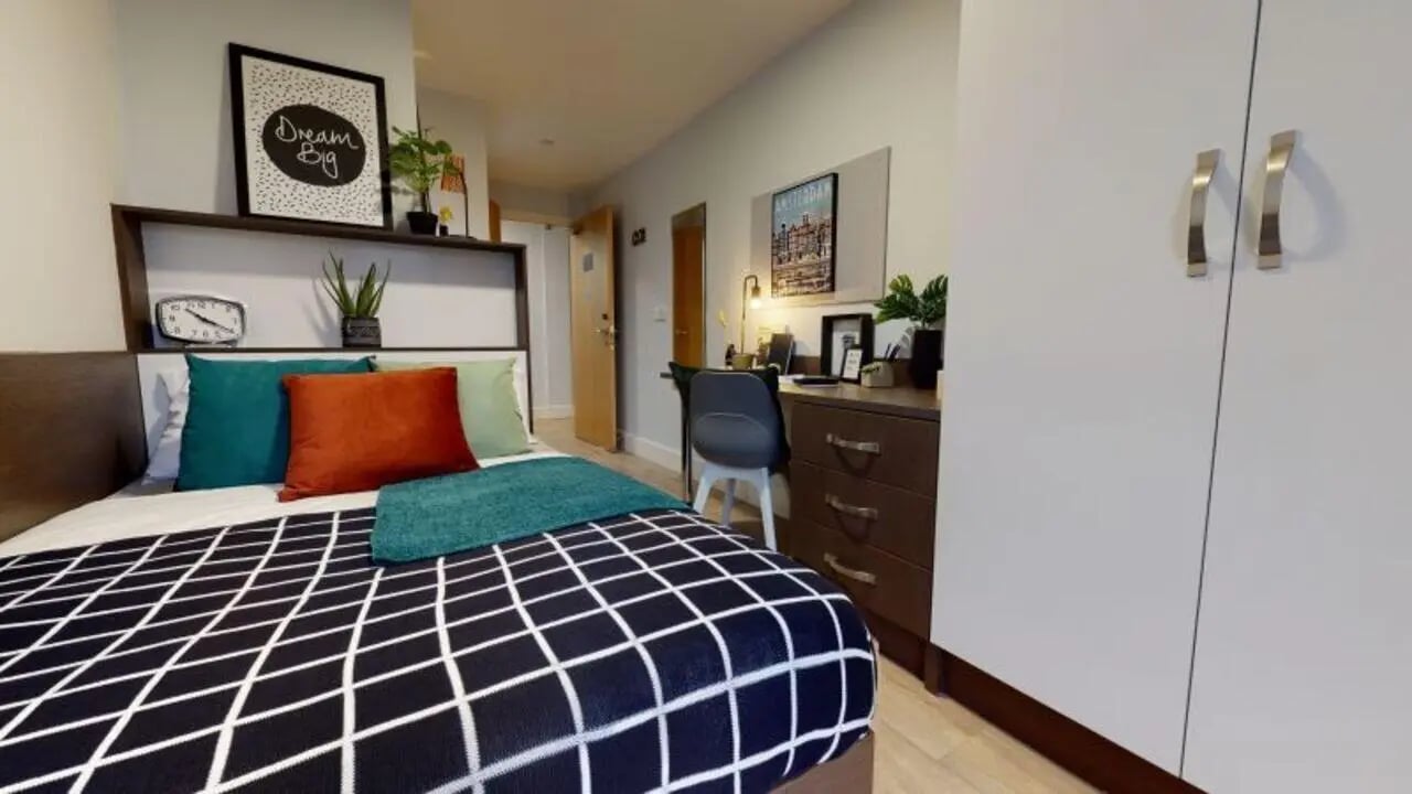 Bed desk and wardrobe bedroom at iQ Penworks House in Birmingham Student Accommodation