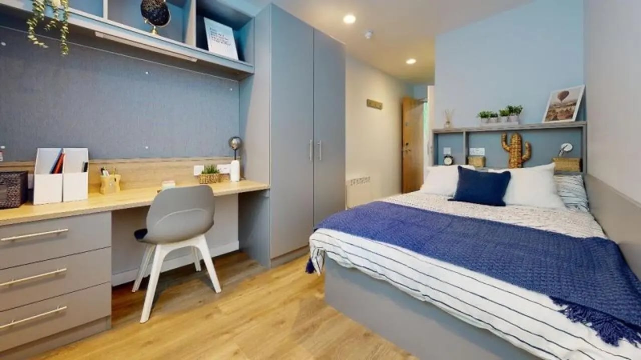 Desk chair bed wardrobe with shelving bedroom at iQ Nelson Court in Nottingham Student Accommodation