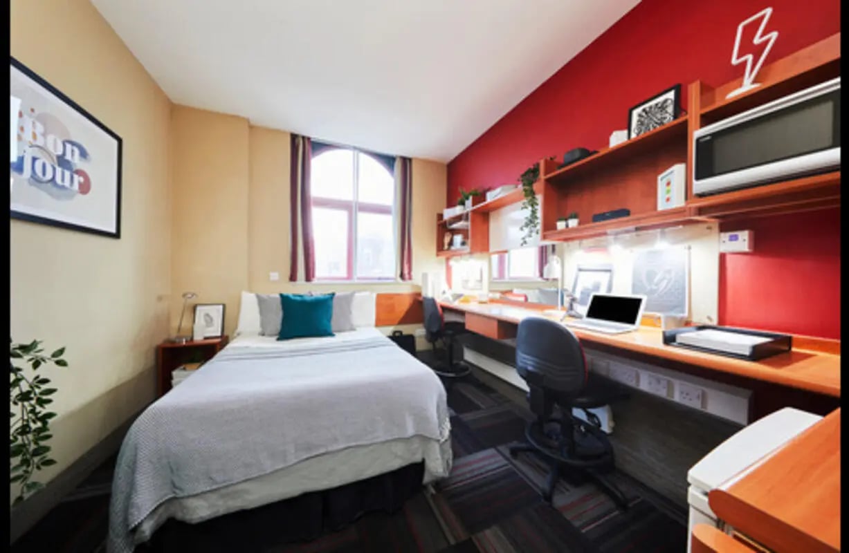 Bed desk lamp and microwave bedroom at Burges House in Coventry Student Accommodation