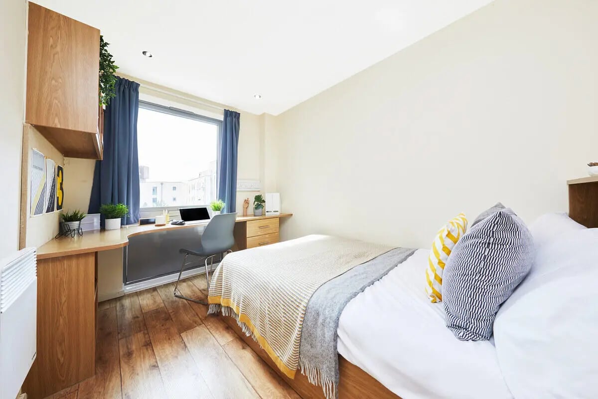 Bed desk and chair student bedroom at Collegiate Athena Hall in Ipswich Student Accommodation