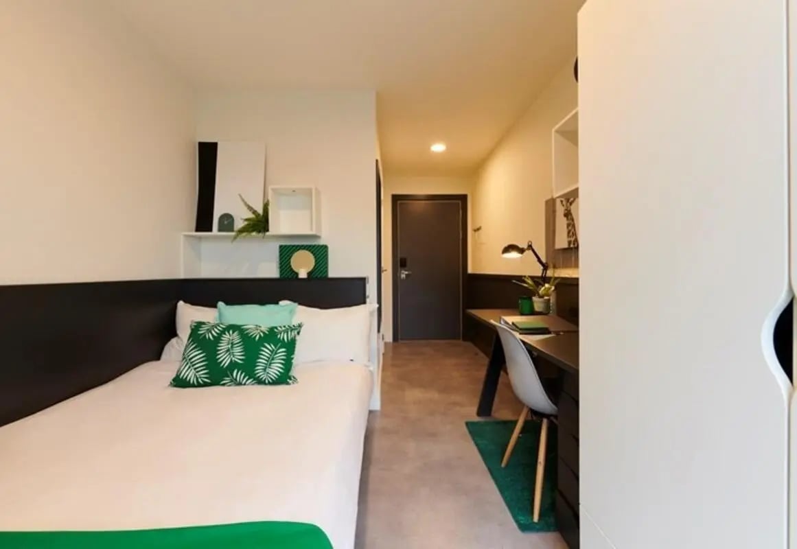 Bed desk with chair and shelves bedroom at Dorset Point in Dublin Student Accommodation