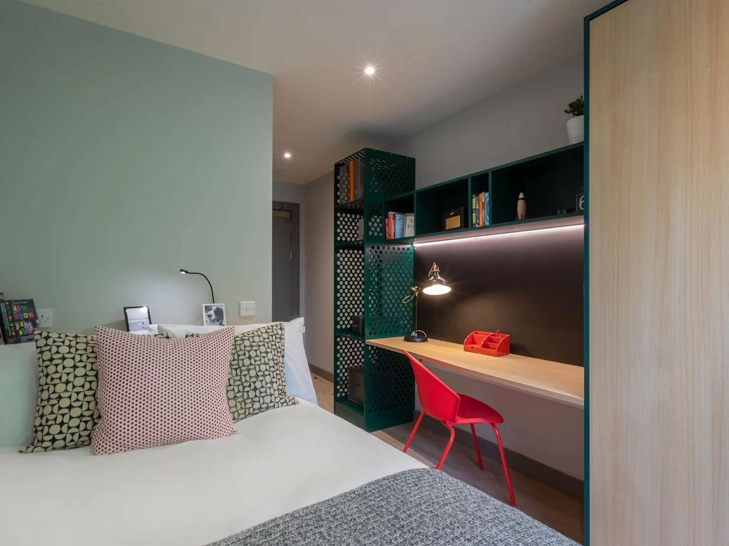 Bed desk chair bookshelf and lamp student room at Highlight Thomas Street in Dublin Student Accommodation