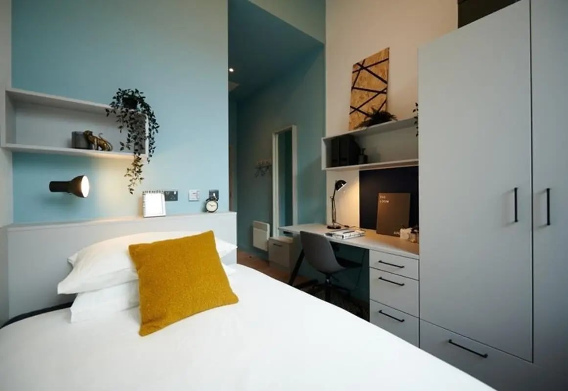 Bed desk lamp wardrobe study area bedroom at The Loom in Dublin Student Accommodation