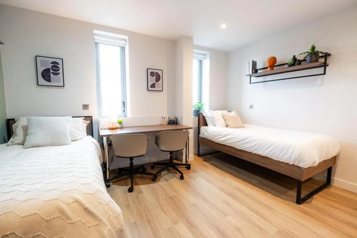 Two beds and a desk shared bedroom at Arasain P&V in Dublin Student Accommodation