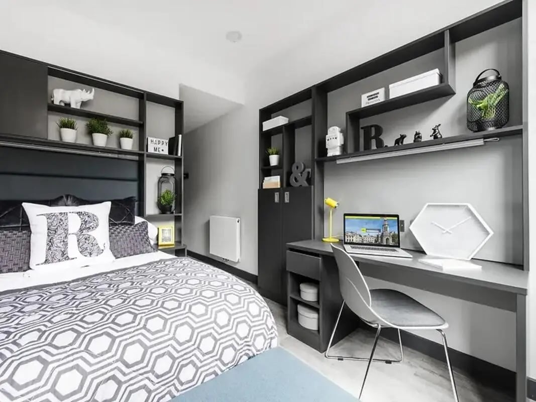 Bed with desk and shelves bedroom at New Mill in Dublin Student Accommodation