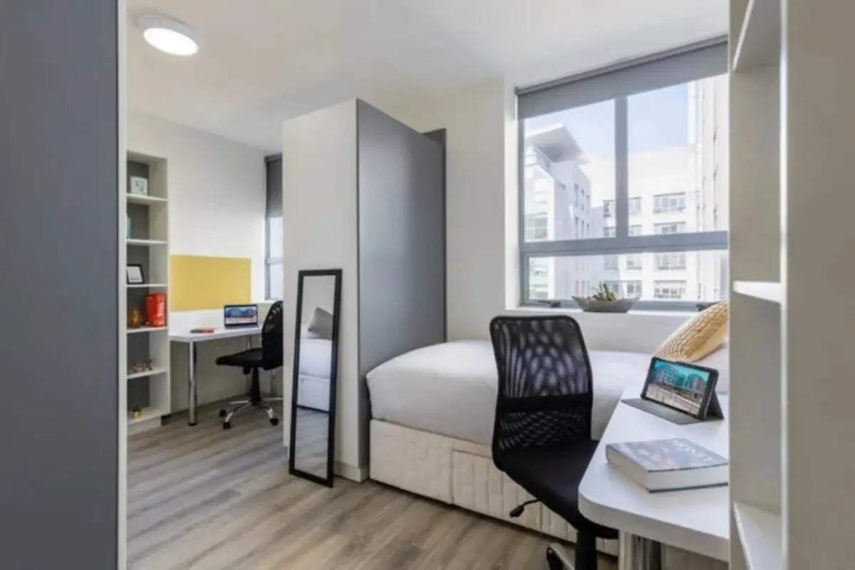 Bed desks mirror and shelves bedroom study area at Mayor Square in Dublin Student Accommodation