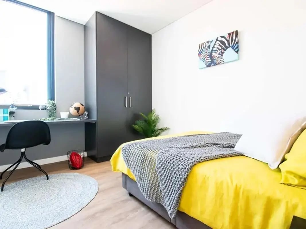 Desk wardrobe bed zebra art bedroom at Yugo Perth City in Perth Student Accommodation