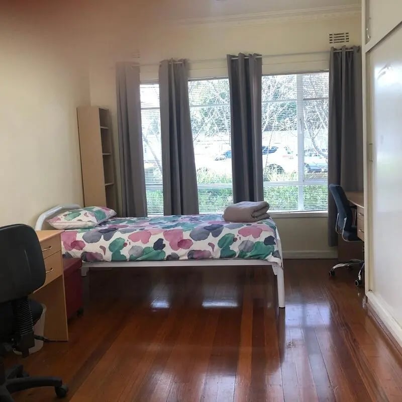 Bed desk and shelf student bedroom. at Classical House in Melbourne Student Accommodation