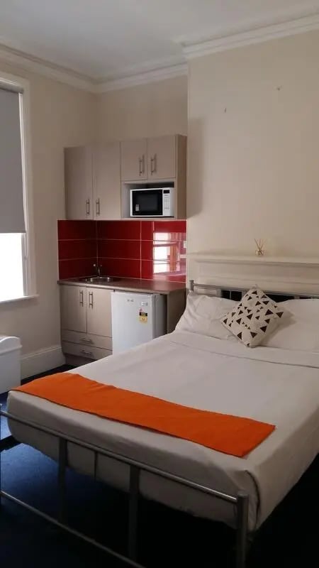 Bed microwave sink small fridge kitchen bedroom at ume Redfern in Sydney Student Accommodation