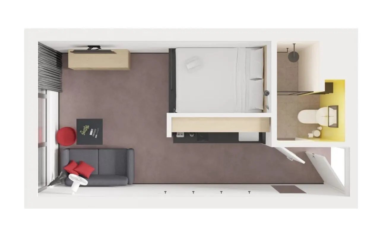 Bed couch TV table bathroom and shower bedroom at UKO Newtown in Sydney Student Accommodation