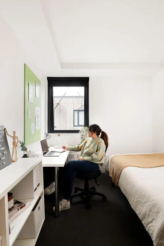 Desk laptop bed and mannequin bedroom at Iglu Broadway in Sydney Student Accommodation