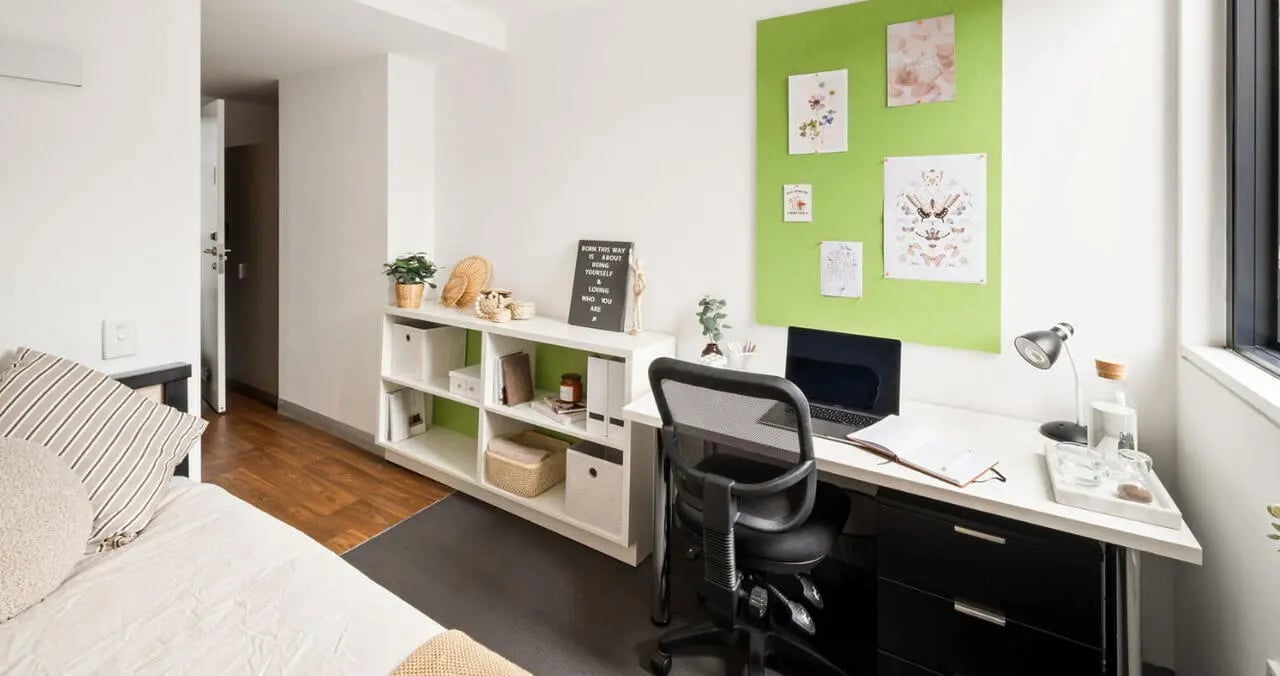 Desk chair shelves laptop and bed bedroom at Iglu Broadway in Sydney Student Accommodation