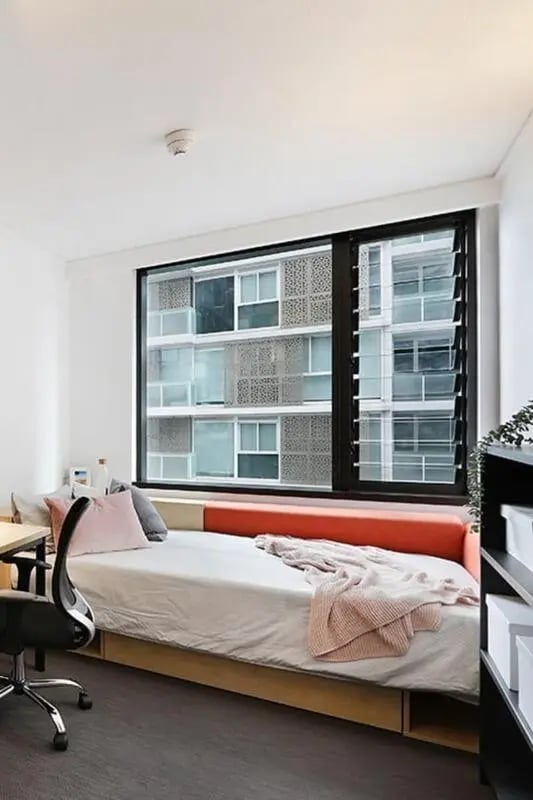 Bed desk chair window view bedroom at Iglu South Yarra in Melbourne Student Accommodation