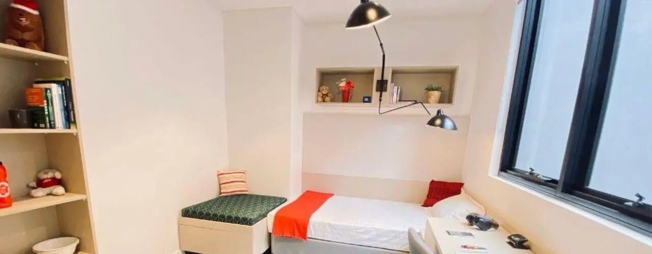 Bed bookshelf storage bench and desk Bedroom at UniLodge Ultimo in Sydney Student Accommodation