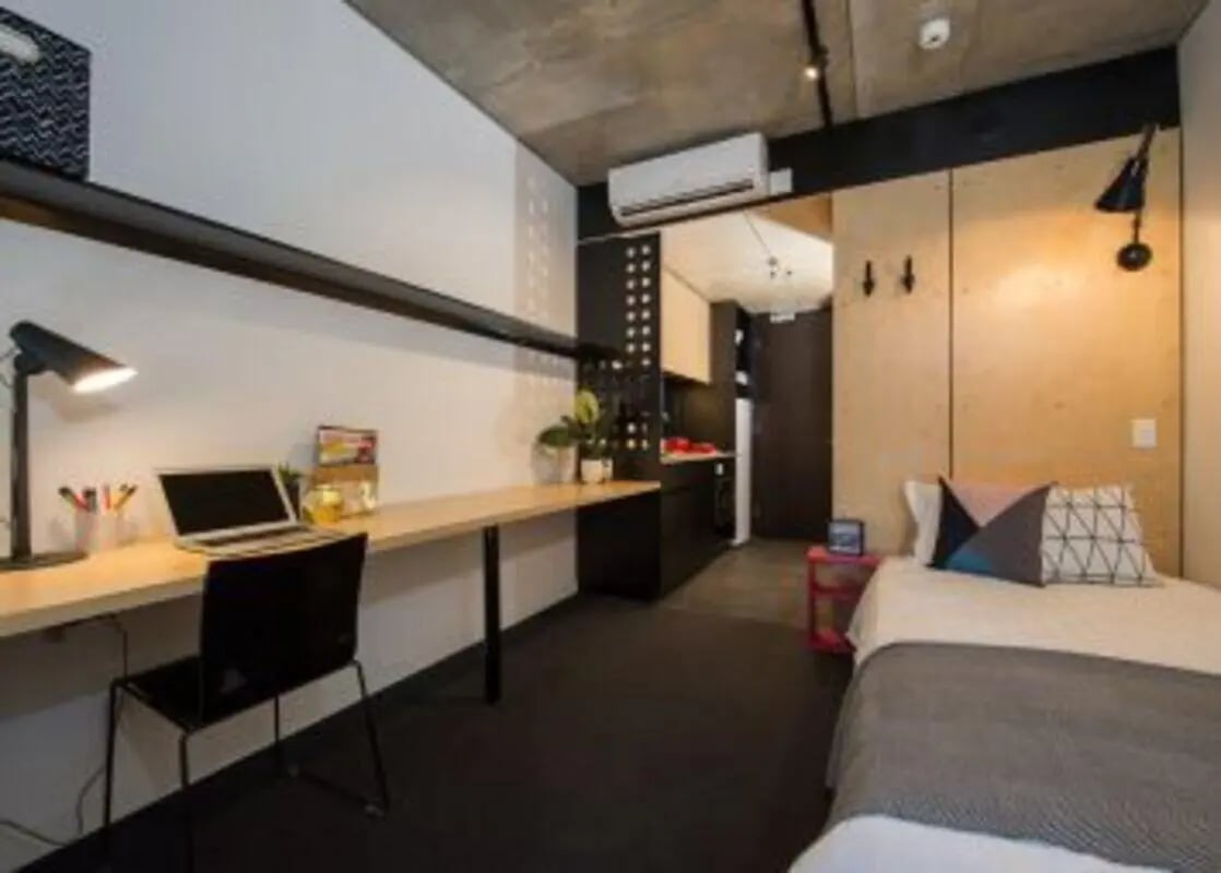 Desk with laptop chair and bed Bedroom at UniLodge @ RMIT Bundoora-Walert House in Melbourne Student Accommodation