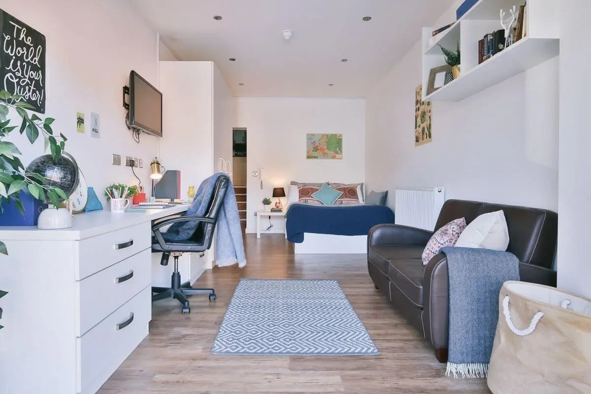 Desk chair bed sofa rug study bedroom living room at 136 New Walk Leicester in Leicester Student Accommodation