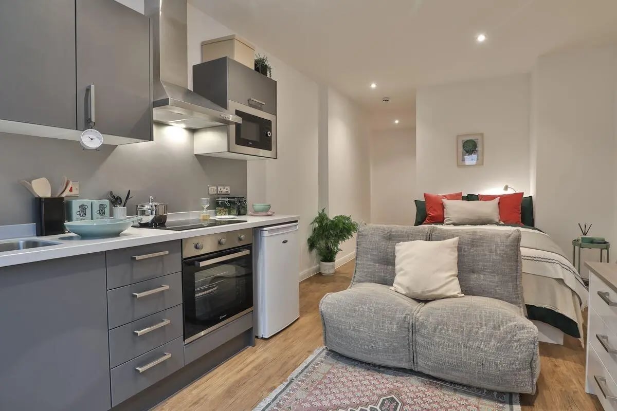 Kitchen sofa bed and artwork studio apartment at 140 New Walk Leicester in Leicester Student Accommodation