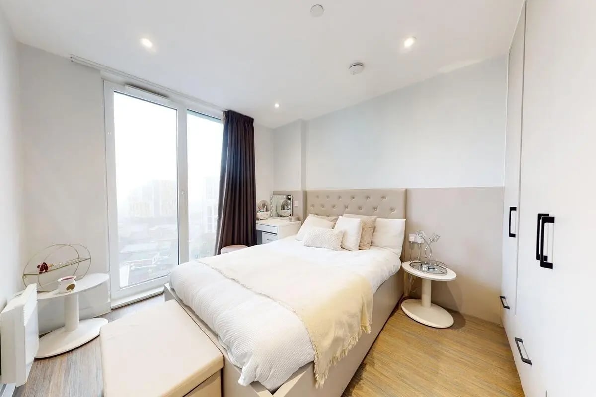 Bed wardrobe dressing table bedroom interior at Canvas Coventry City Club in Coventry Student Accommodation