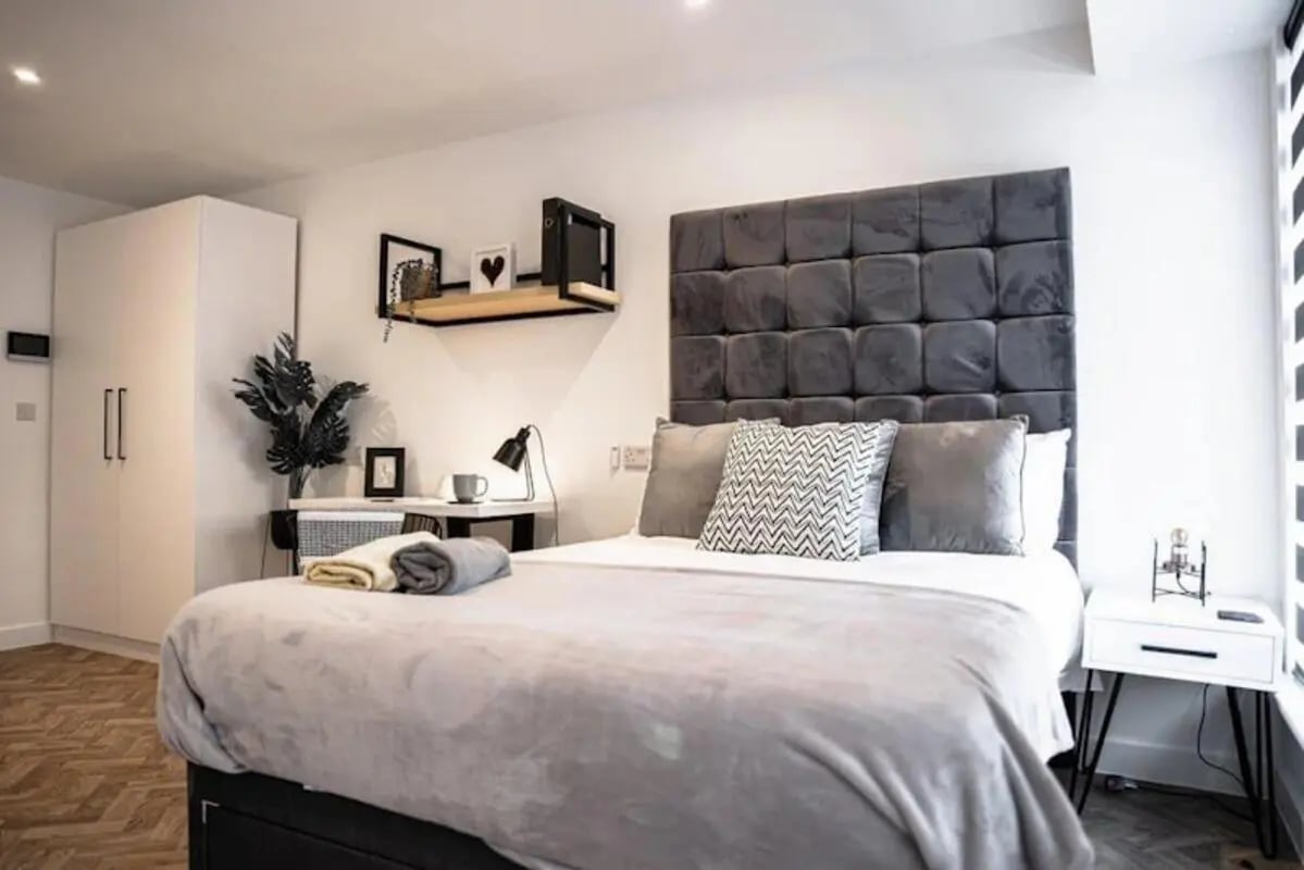 Bed desk wardrobe and decor bedroom at Bridge Street Studios in Birmingham Student Accommodation