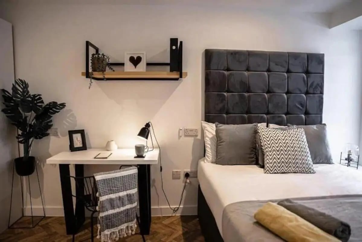 Desk plant bed and headboard bedroom at Bridge Street Studios in Birmingham Student Accommodation