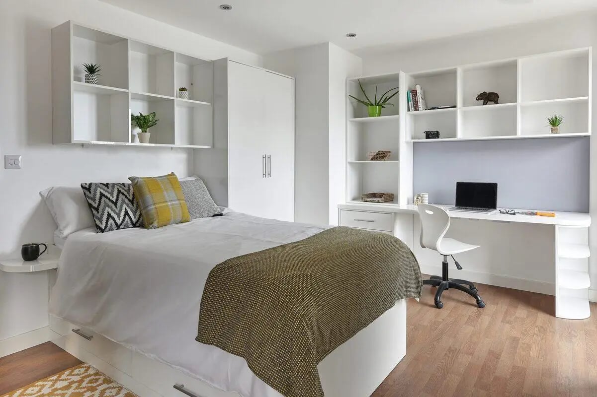 Bed desk plants and shelves student bedroom at Hope Street in Liverpool Student Accommodation