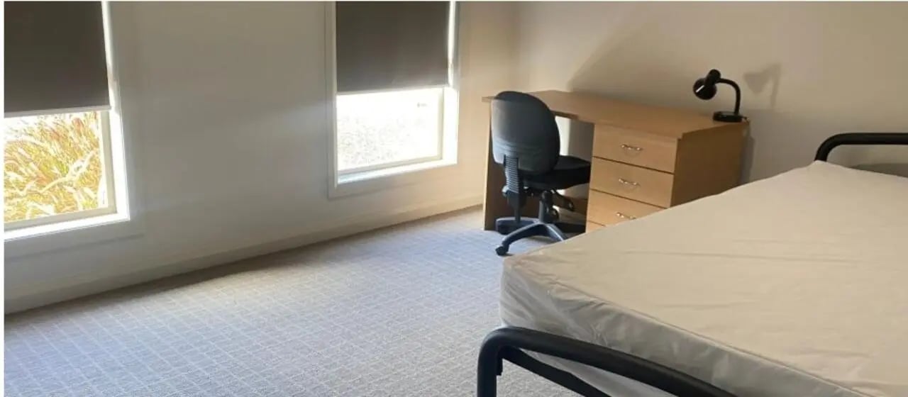 Bed desk chair lamp window bedroom at La Trobe University Regional Housing - Shepparton in Shepparton Student Accommodation