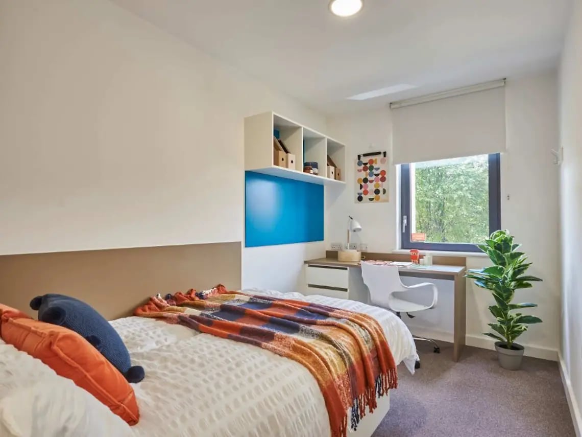 Bed desk shelves and window bedroom at Grand Felda House in Wembley Student Accommodation