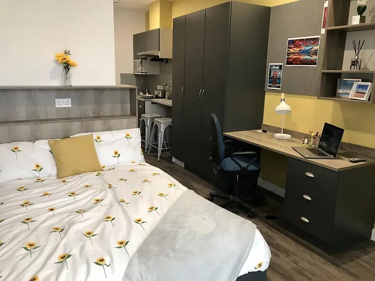 Bed desk and wardrobe student studio apartment at Yugo Catherine House in Portsmouth Student Accommodation