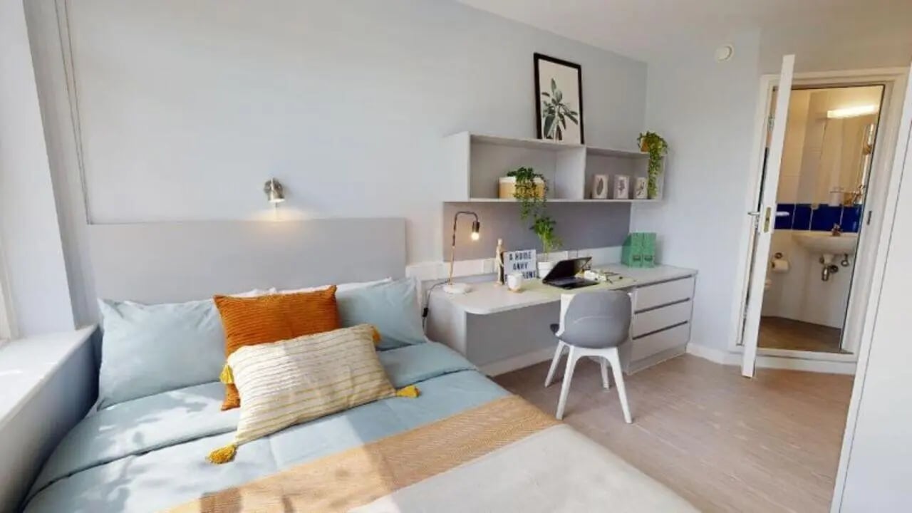 Bed desk chair and bathroom view Bedroom at iQ Tufnell House in London Student Accommodation