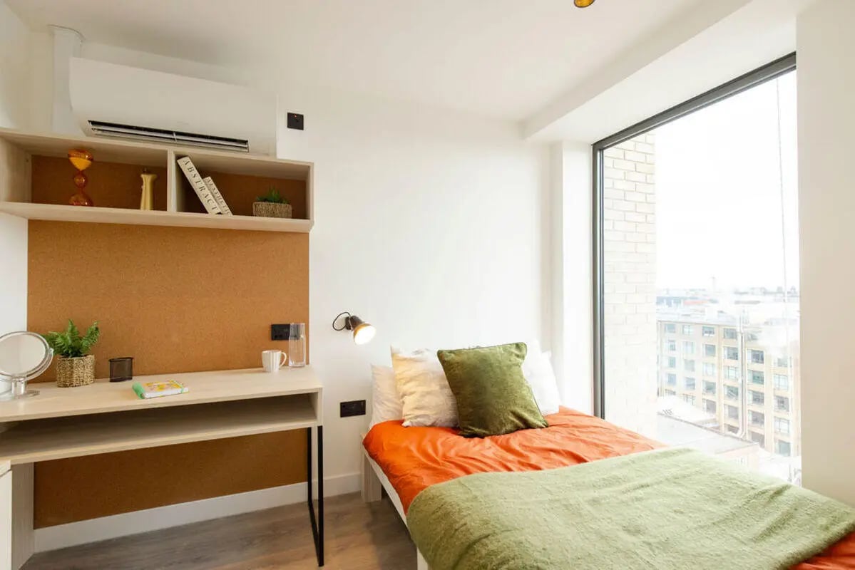 Bed desk shelving window view bedroom at Martha Street Apartments in Glasgow Student Accommodation