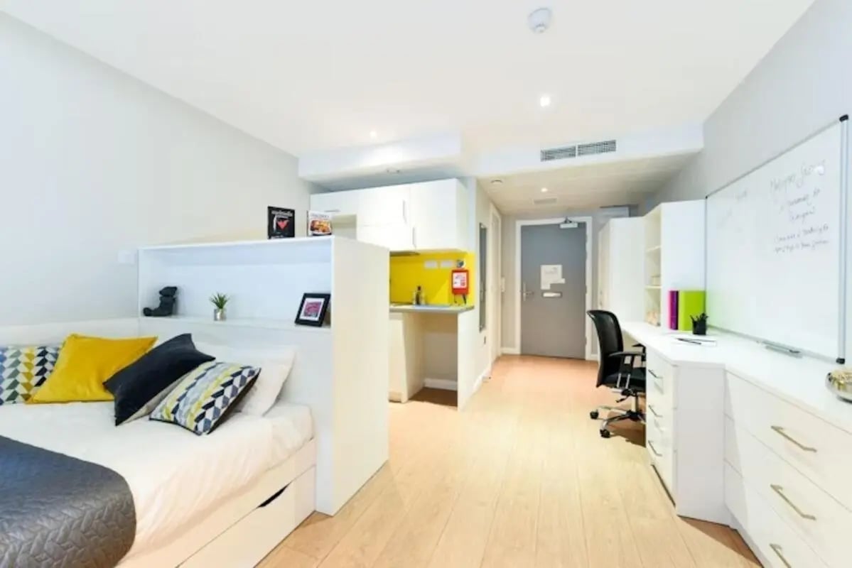 Bed desk kitchenette and whiteboard studio apartment at Merchant Studios in Glasgow Student Accommodation
