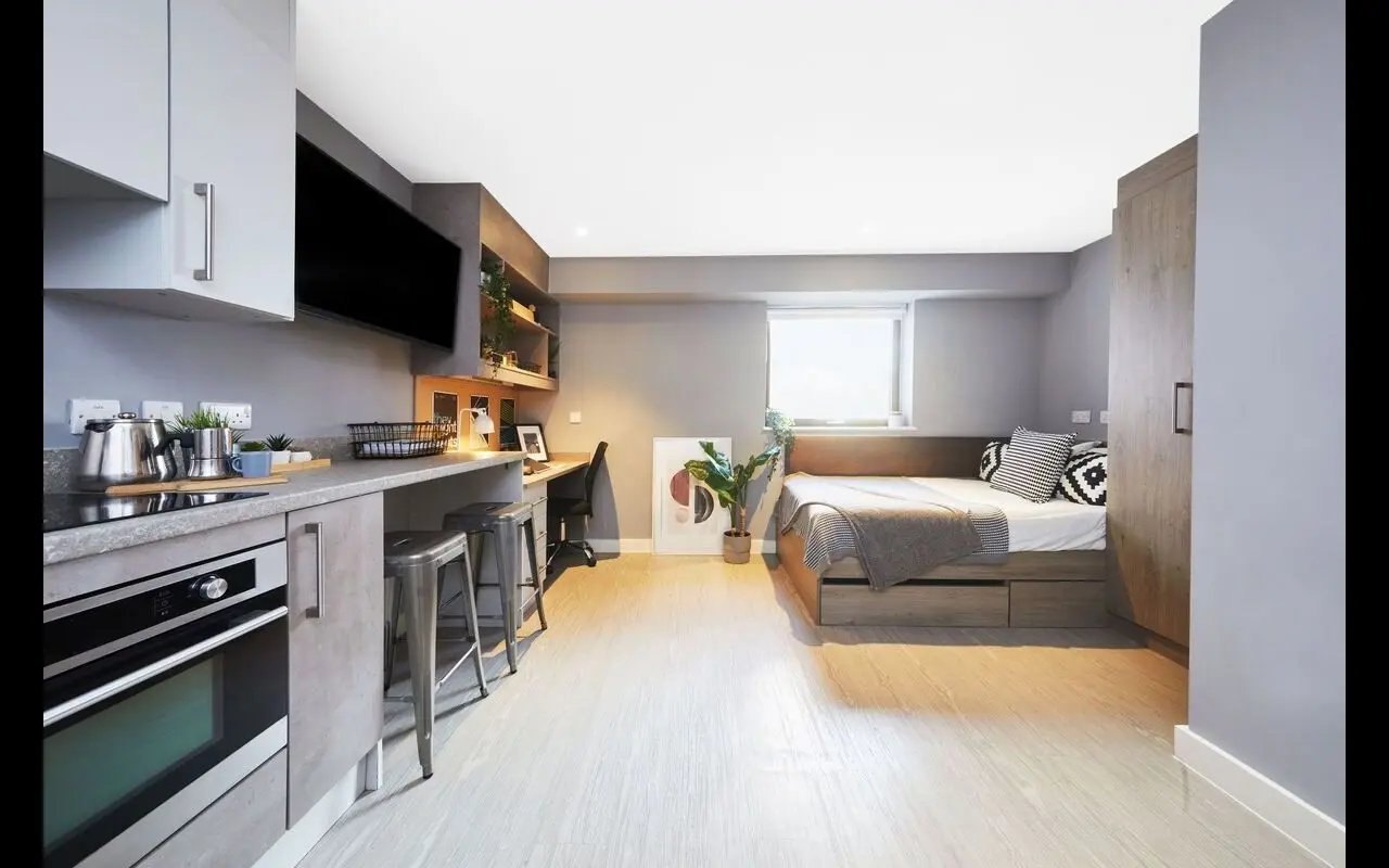 Kitchen bed desk and wardrobe studio apartment at Collegiate Nova in Nottingham Student Accommodation