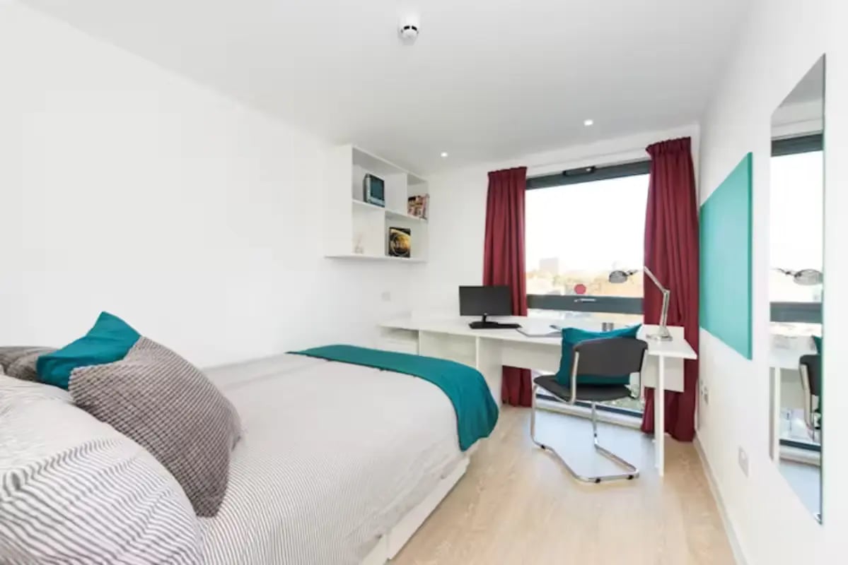 Bed desk chair and shelves student room at Vincent Place in Southampton Student Accommodation