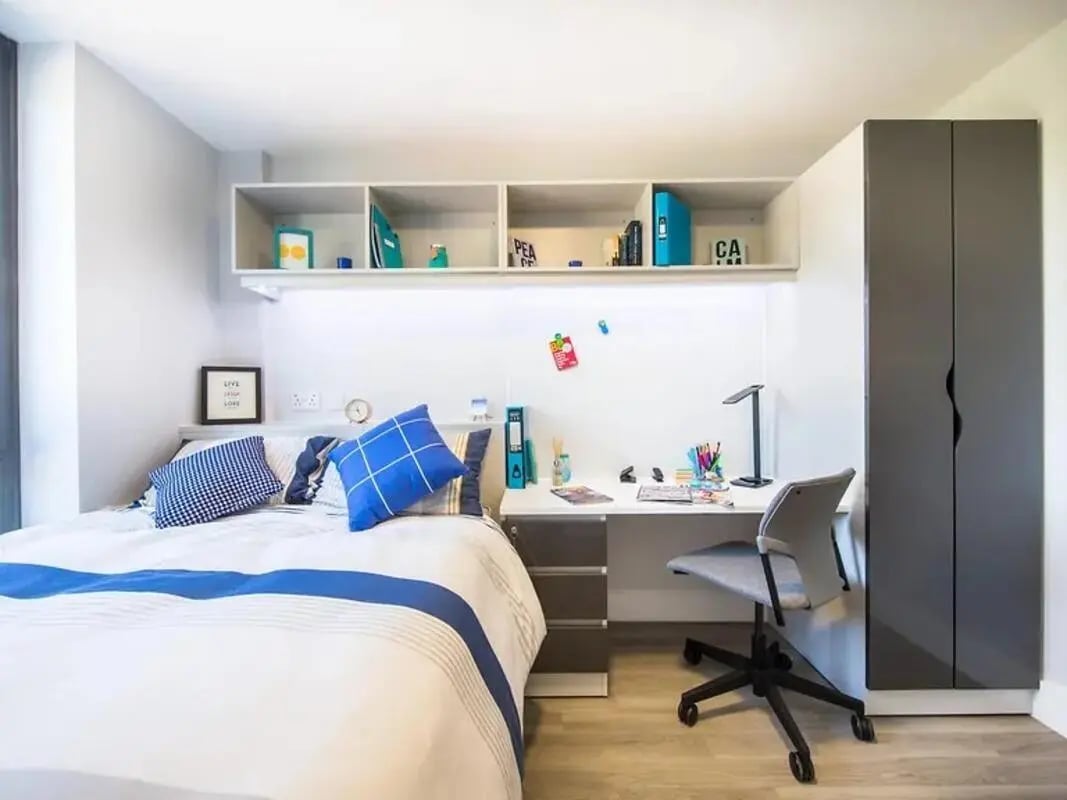 Bed desk closet shelving student accommodation bedroom at ViBe Student Living in Kingston Upon Thames Student Accommodation